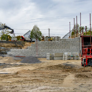 A stone wall being constructed.