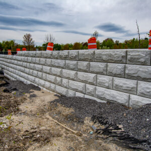 The stone wall looks to be completed.