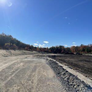 Preparing the 13 acre site for grading and paving.