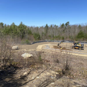 Site work shot from a hill.