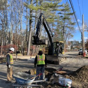 Digging hole for drainage.