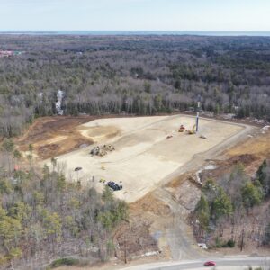Angled drone shot of future distribution facility.