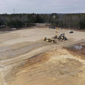 Angled drone shot of future distribution facility.