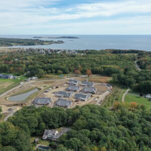 A high up Ariel view of the Piper Shores community worksite. From this view it is apparent how close the community is to the ocean.